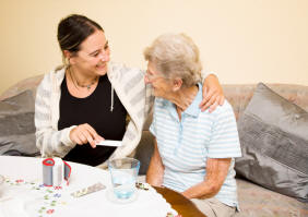 Elderly Person with a Caregiver